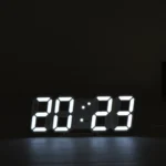 White 3D LED Digital Clock displaying 09:38 on a modern desk