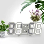White 3D LED Digital Clock displaying 09:38 on a modern desk
