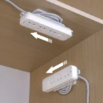 Adhesive mount power strip with 3 universal outlets and cable management