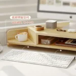 Corner monitor stand with keyboard storage and ergonomic design