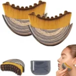 Crescent shaped ergonomic makeup brush for facial contouring and foundation.