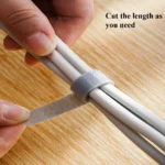 Cut-to-length hook and loop cable organizer roll