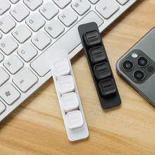 Desk cable organizer kit, adhesive, magnetic, clip-on for tidy workspace.