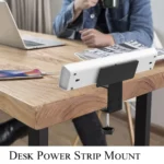 Desk power strip mount with USB, clamped to wooden desk