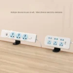 Desk power strip mount with USB, clamped to wooden desk