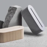 Fluted desktop cable management box with smartphone charging slot