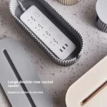 Fluted desktop cable management box with smartphone charging slot