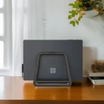 Minimalist dark gray tablet and phone desktop stand
