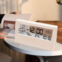 Minimalist digital weather station clock with thermometer and hygrometer
