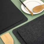 Dual-sided appliance slider mat with non-slip and heat-proof features.