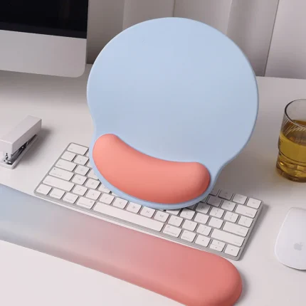 Ergonomic keyboard and mouse wrist rest set with pastel gradient colors.