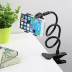 Flexible gooseneck phone holder for bed and desk mounting.