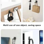 Black adhesive headphone hook holding over-ear headphones under desk