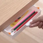 White under-desk pull-out drawer for office supplies