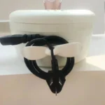 Butterfly shaped appliance cord organizer for kitchen cable management