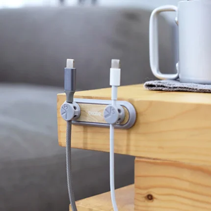Magnetic desktop cable organizer with clips