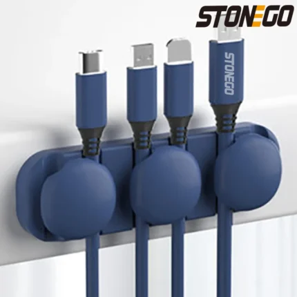 Adhesive silicone cable organizer for desk and wall management.
