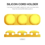 Adhesive silicone cable organizer for desk and wall management.