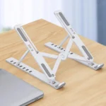 Foldable ergonomic laptop stand with adjustable height and multi-angle design