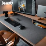 Premium felt desk mat with wooden monitor stand and anti-slip back.