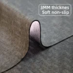Premium felt desk mat with wooden monitor stand and anti-slip back.