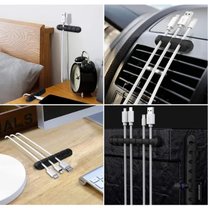 Black silicone cable organizer with adhesive backing holding multiple cords