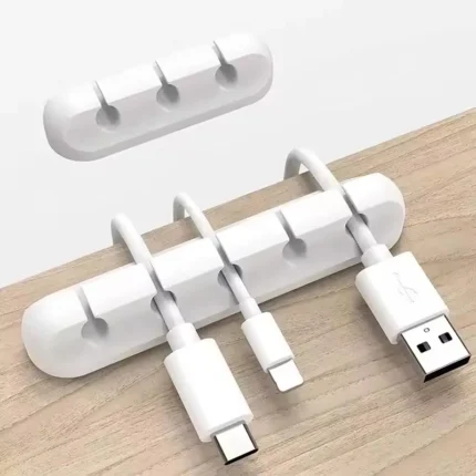 Silicone desktop cable organizer holding multiple USB charging cords