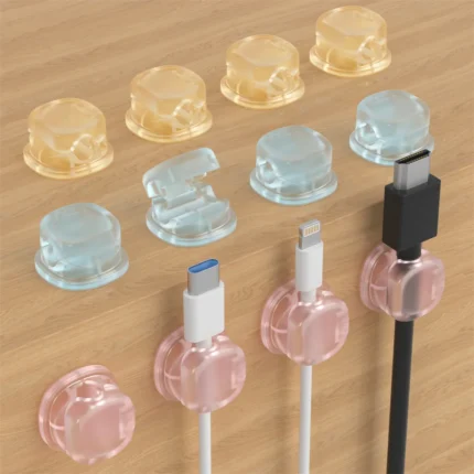 Self-adhesive translucent pastel cable clips for desk organization.