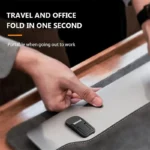 Ultra-thin foldable adhesive laptop stand elevating a silver laptop