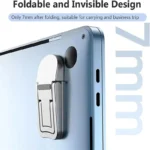 Ultra-thin foldable adhesive laptop stand elevating a silver laptop