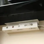 Under-desk metal cable management tray for power strips