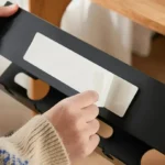 Under-desk metal cable management tray for power strips