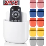 Adhesive wall mount holder for remote controls and smartphones