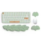 Mint green ergonomic desk set with leaf wrist rests and keyboard