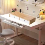 Bamboo monitor stand with white storage drawers and cable cutout