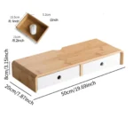 Bamboo monitor stand with white storage drawers and cable cutout