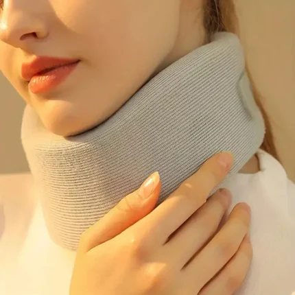 Soft grey cervical neck support brace with adjustable strap