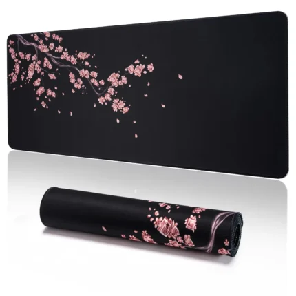 Large cherry blossom desk mat with non-slip base and stitched edges