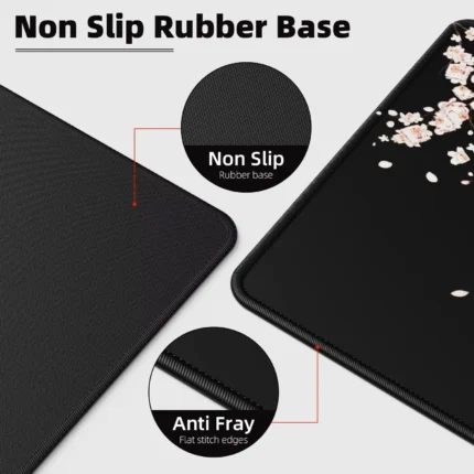 Large cherry blossom desk mat with non-slip base and stitched edges