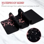 Large cherry blossom desk mat with non-slip base and stitched edges
