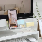 Clear acrylic monitor shelf with phone holder and sticky note display