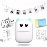 Cute portable thermal printer printing family photo from smartphone app