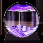 Dynamic sand art display, moving sandscape, ever-changing patterns