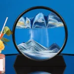Dynamic sand art display, moving sandscape, ever-changing patterns