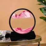 Dynamic sand art display, moving sandscape, ever-changing patterns