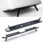 Slim adhesive foldable laptop stand elevating a black laptop.