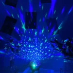 Multi-color galaxy star projector light with moon and nebula effects