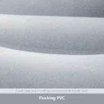 Grey inflatable camping pillow on sleeping bag in tent