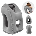 Inflatable travel pillow with face opening for neck and arm support