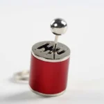 Interactive manual gear shift keychain with movable lever